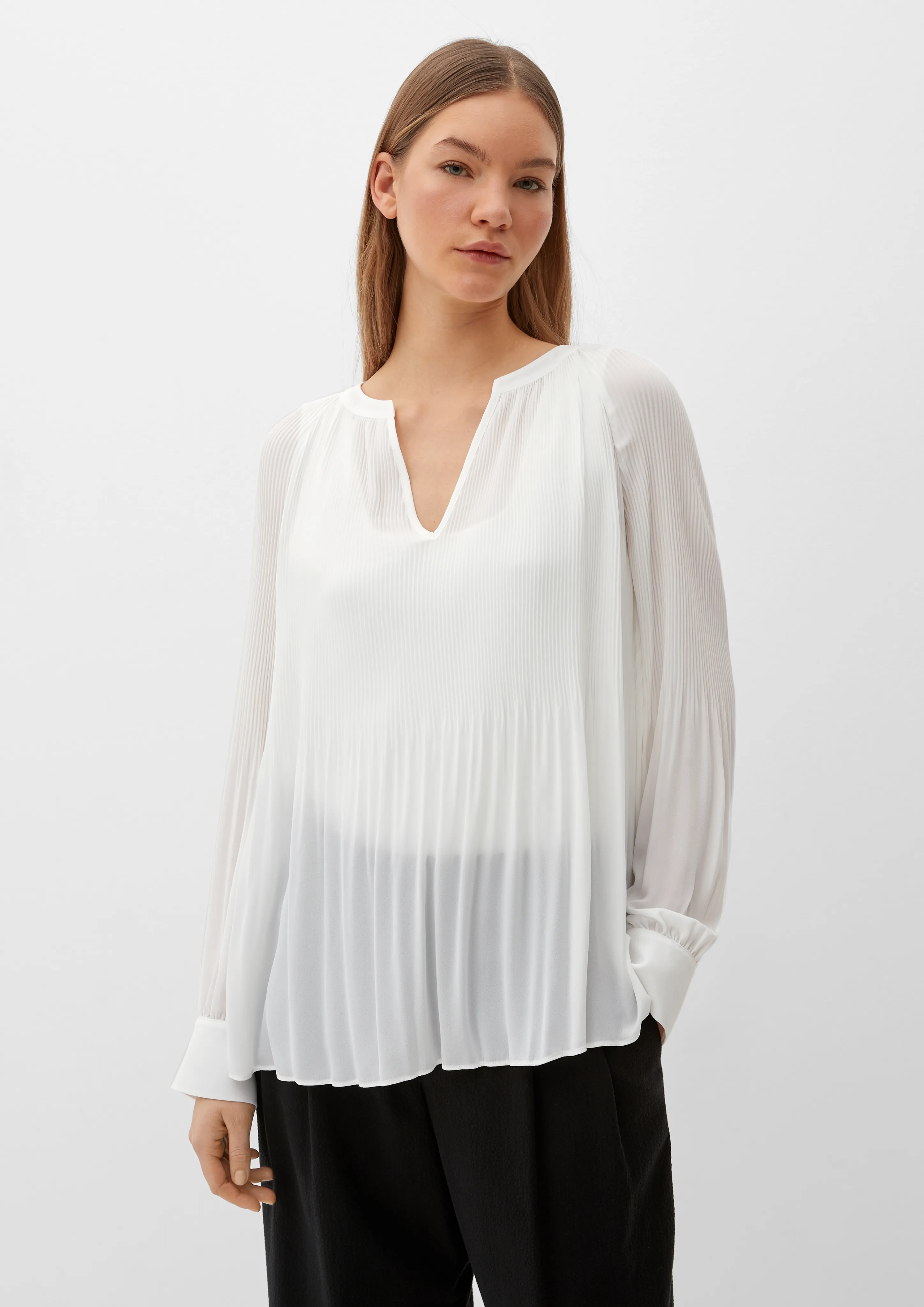 Blouse with a pleated texture